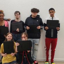 youth hold certificates