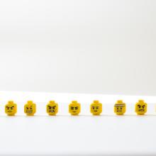 lego heads showing various emotions