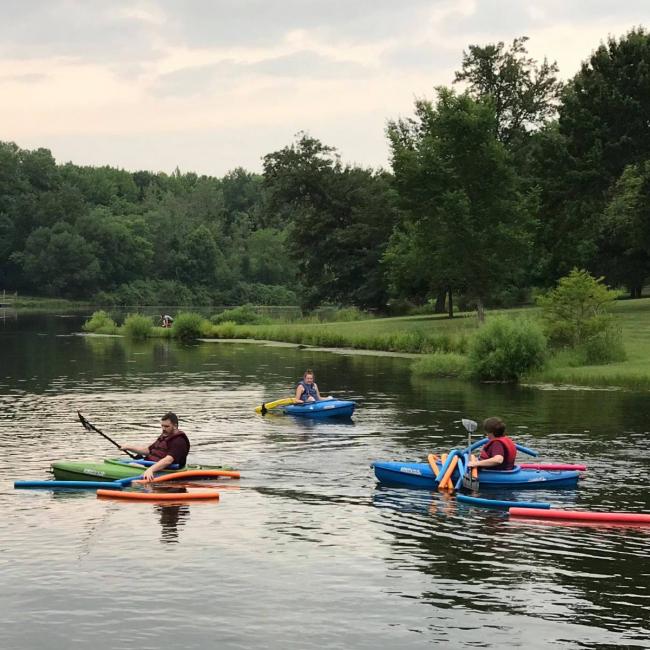 family kayaking