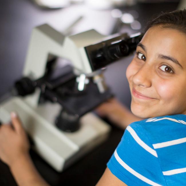 Girl with microscope