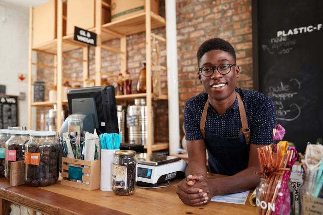 Man at counter of grocery co-op